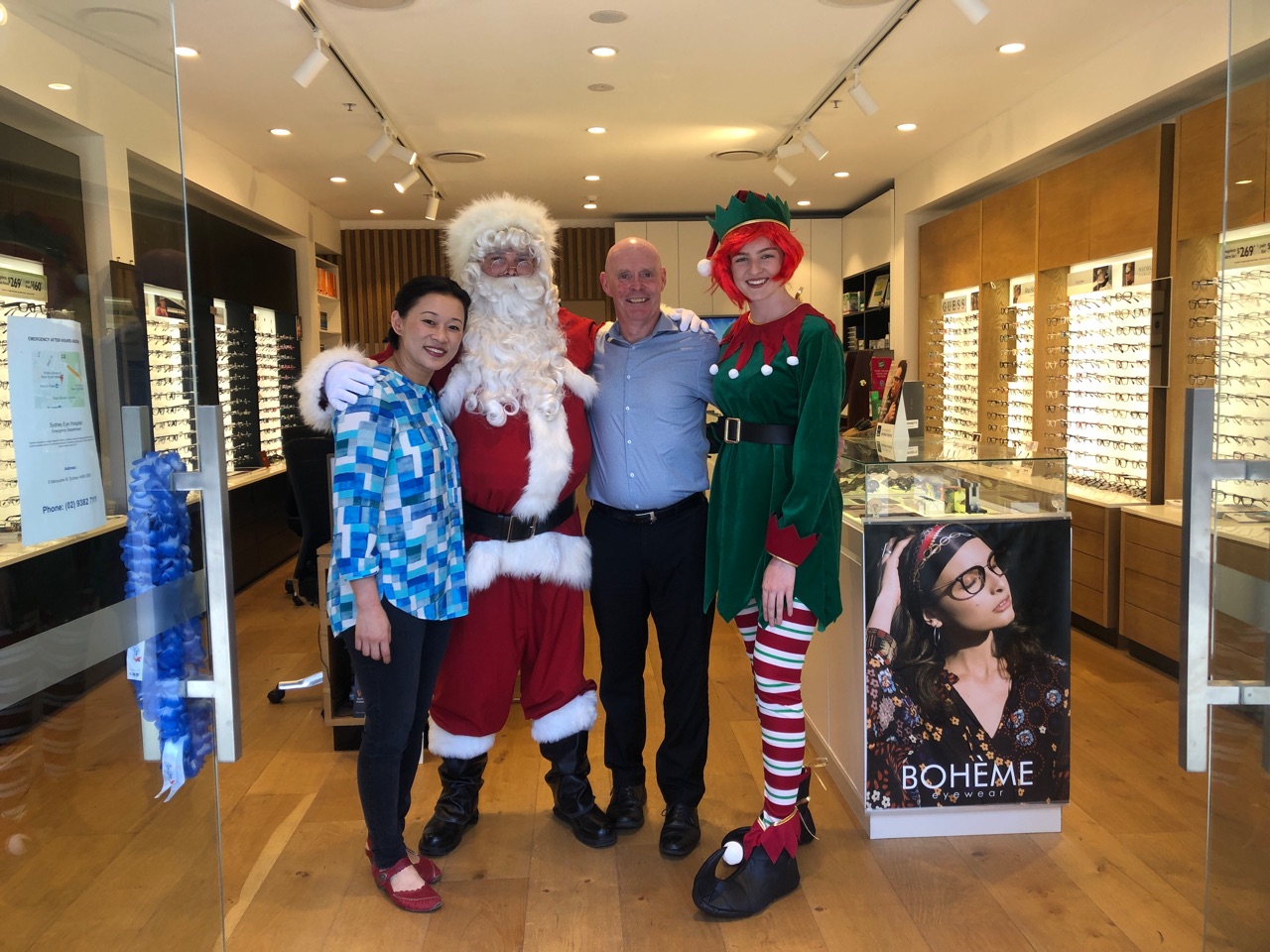 Left to right: Optometrist Dr SooJin, Santa, Qualified Optical Dispenser Mark and Lovely Elf Lady.